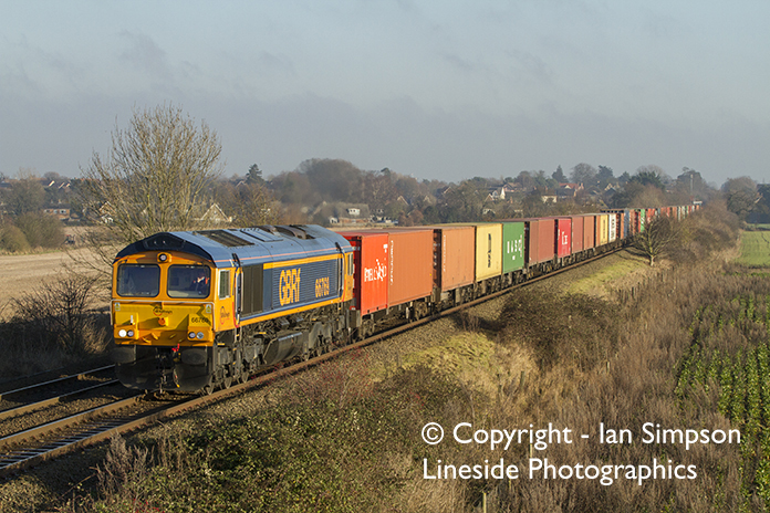 GBRf Class 66 66769 climbs away from Thurston with the 4M23 11.22 Felixstowe North to Doncaster Railport on Wednesday 28th December.